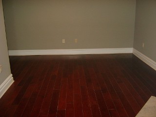 Bedroom with Wood Flooring - Before