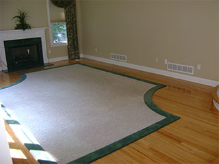 Living Room with Fireplace and Rug Before