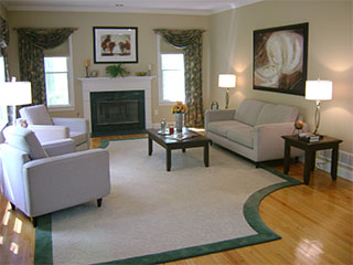 Living Room with Fireplace and Rug After