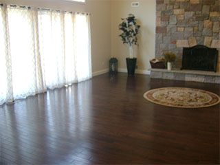 Living Area with Large Stone Fireplace Before