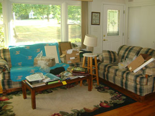 Living Room with Large Window and Front Door - Before