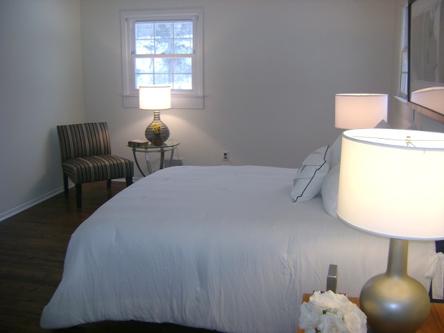 Empty Bed Room with White Painted Wall Side View - After